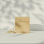 Product packaging with 'Promise' branding on a neutral background