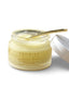 Jar of Promise radiance balm with a white lid on a white background
