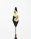 Butterfly on a black and brown tool against a white background