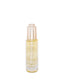 Bottle of Romand facial oil on a white background